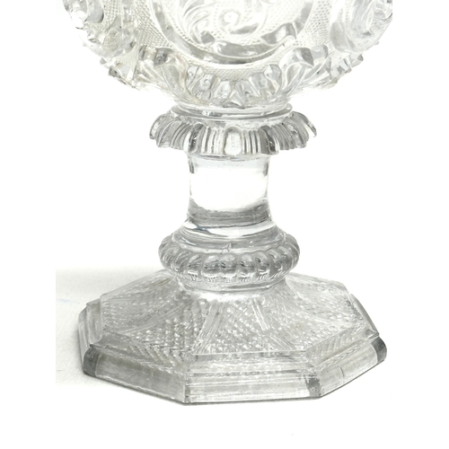 46 - A Mid 19th Century Baccarat pressed glass goblet. 9x14cm