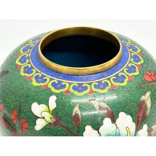 53 - An Early 20th Century Chinese cloisonné enamelled jar with lid and wooden base. 11x14cm without stan... 