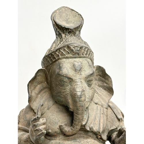 84 - A large 19th Century bronze Ganesha statue. 22x18x31cm.