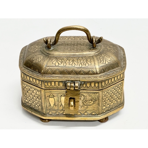 87 - A Late 19th Century Rajasthan Indian brass pandan box. 17x12x13cm.