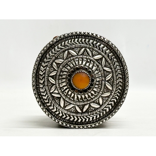 11 - A 19th Century Algerian silver and coral canister. 10x11.5cm.