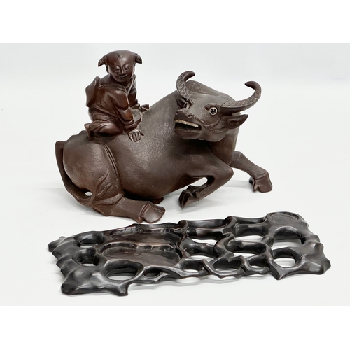 89 - A good quality Early 20th Century Chinese carved boxwood water buffalo and rider. With glass eyes an... 