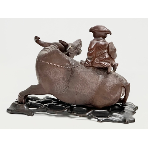 89 - A good quality Early 20th Century Chinese carved boxwood water buffalo and rider. With glass eyes an... 