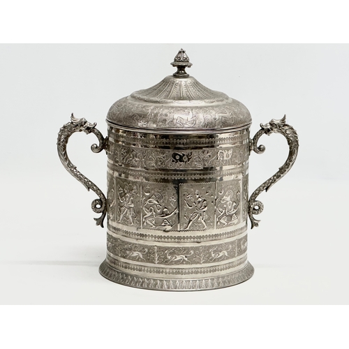 114 - A Late 19th Century silver plated biscuit barrel by Lee & Wigfull Ltd. Decorated with East Asian god... 