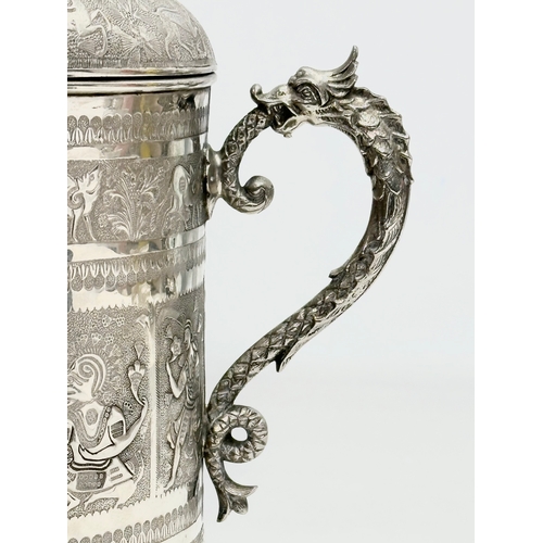 114 - A Late 19th Century silver plated biscuit barrel by Lee & Wigfull Ltd. Decorated with East Asian god... 