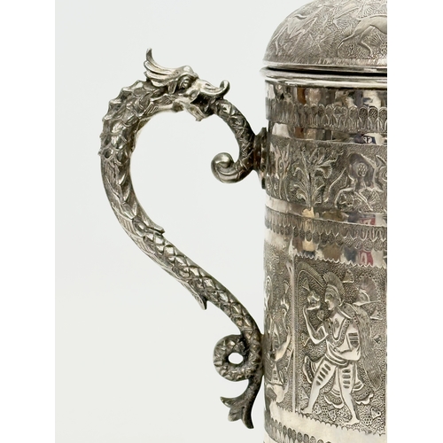 114 - A Late 19th Century silver plated biscuit barrel by Lee & Wigfull Ltd. Decorated with East Asian god... 