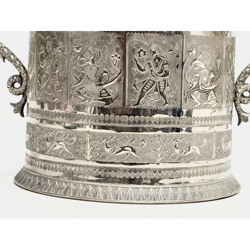 114 - A Late 19th Century silver plated biscuit barrel by Lee & Wigfull Ltd. Decorated with East Asian god... 