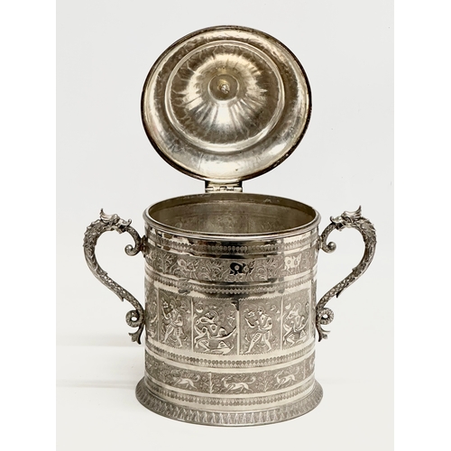 114 - A Late 19th Century silver plated biscuit barrel by Lee & Wigfull Ltd. Decorated with East Asian god... 