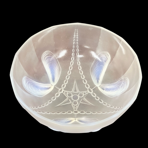 13 - Sabino Art Glass. A 1920’s French opalescent glass bowl by Sabino. Raised on shell style feet. 21x8c... 