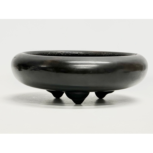 117 - A 19th Century Japanese black basalt bowl. Meiji Period (1868-1912). 25x8cm.