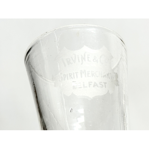 160 - Irvine & Co. 2 drinking glasses. Irvine & Co, Belfast. Spirit Merchants. 9.5cm. 9cm.