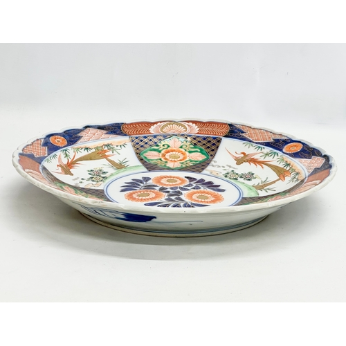 162 - Yamatoku. A large Late 19th Century Japanese Imari charger. Yamatoku mark. Meiji Period (1868-1912) ... 