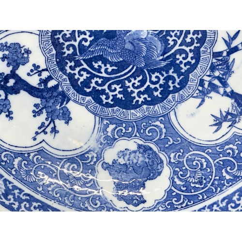 164 - A very large Late 19th/Early 20th Century Japanese Arita blue and white charger. Meiji Period (1868-... 