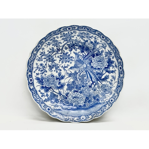 165 - A Late 19th Century Japanese blue and white charger/bowl. Meiji Period (1868-1912) 30.5x5.5cm.