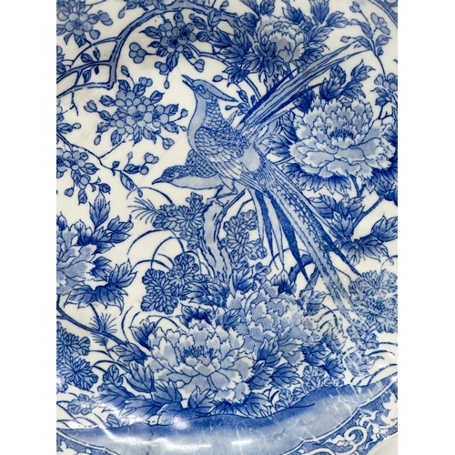 165 - A Late 19th Century Japanese blue and white charger/bowl. Meiji Period (1868-1912) 30.5x5.5cm.