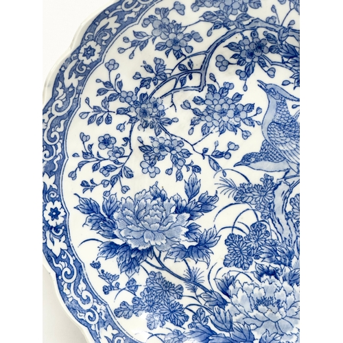 165 - A Late 19th Century Japanese blue and white charger/bowl. Meiji Period (1868-1912) 30.5x5.5cm.