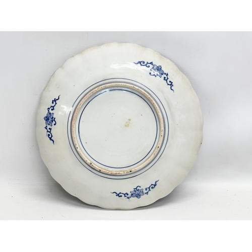 165 - A Late 19th Century Japanese blue and white charger/bowl. Meiji Period (1868-1912) 30.5x5.5cm.