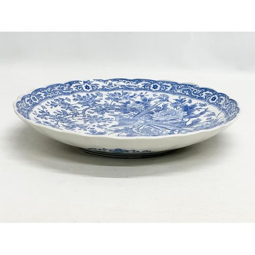 165 - A Late 19th Century Japanese blue and white charger/bowl. Meiji Period (1868-1912) 30.5x5.5cm.