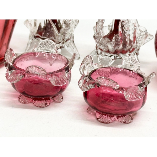 210 - A collection of 19th Century cranberry and ruby glass. A pair of Late 19th Century Bohemian ruby gla... 