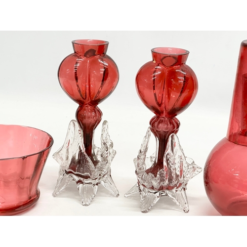 210 - A collection of 19th Century cranberry and ruby glass. A pair of Late 19th Century Bohemian ruby gla... 