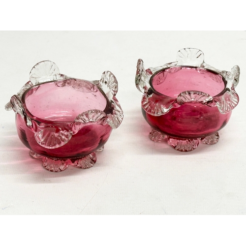 210 - A collection of 19th Century cranberry and ruby glass. A pair of Late 19th Century Bohemian ruby gla... 