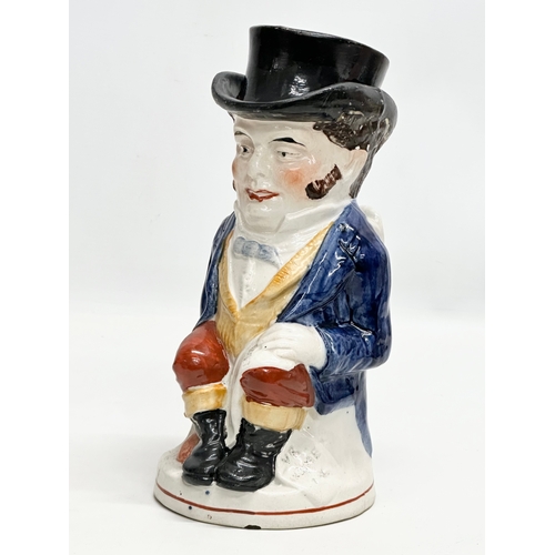 254 - A Late 19th Century Staffordshire Pottery ‘John Bull’ toby jug. 24cm.