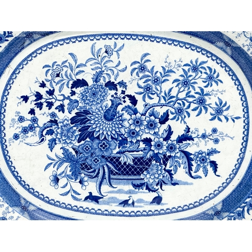 256 - An Early 19th Century English blue and white meat platter. 47x39cm.