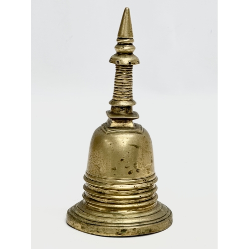 168 - A 19th Century brass Stupa style bell. 16cm