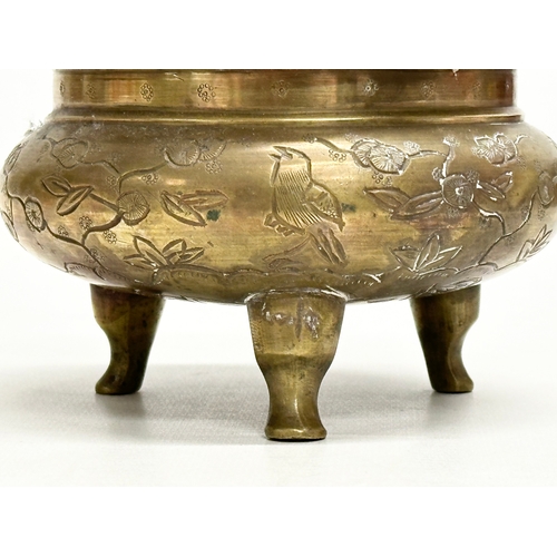 33 - A 19th Century Chinese brass tripod censer/incense burner. With engraved lotus leaves and birds. 13x... 