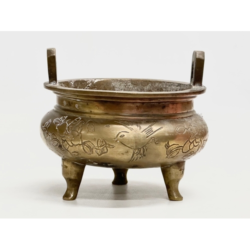 33 - A 19th Century Chinese brass tripod censer/incense burner. With engraved lotus leaves and birds. 13x... 