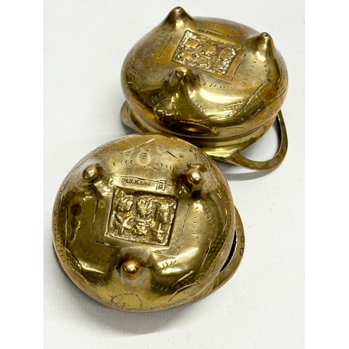 169 - A pair of small Early 20th Century Chinese brass tripod censers. Emperor Xuande seal mark. 7x6.5x5cm... 