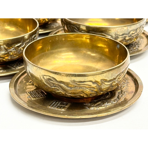 170 - A 12 piece Early/Mid 20th Century Chinese brass bowls and saucers. With embossed seal marks and drag... 