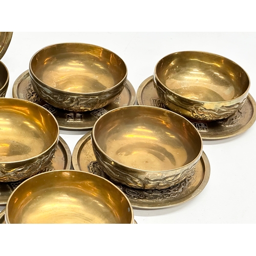 170 - A 12 piece Early/Mid 20th Century Chinese brass bowls and saucers. With embossed seal marks and drag... 