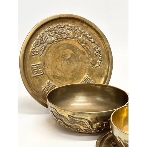 170 - A 12 piece Early/Mid 20th Century Chinese brass bowls and saucers. With embossed seal marks and drag... 