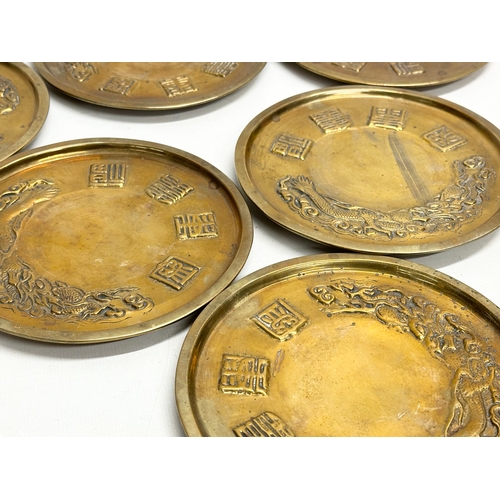 170 - A 12 piece Early/Mid 20th Century Chinese brass bowls and saucers. With embossed seal marks and drag... 