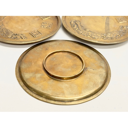 170 - A 12 piece Early/Mid 20th Century Chinese brass bowls and saucers. With embossed seal marks and drag... 