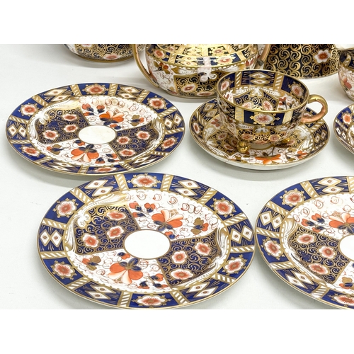 239 - A 19th Century Imari porcelain tea service. Red Crown Mark. Davenport/Derby. 16 pieces.