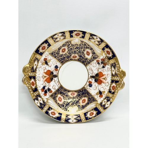 239 - A 19th Century Imari porcelain tea service. Red Crown Mark. Davenport/Derby. 16 pieces.