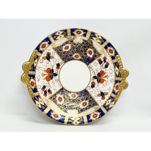 239 - A 19th Century Imari porcelain tea service. Red Crown Mark. Davenport/Derby. 16 pieces.