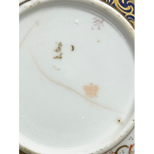 239 - A 19th Century Imari porcelain tea service. Red Crown Mark. Davenport/Derby. 16 pieces.