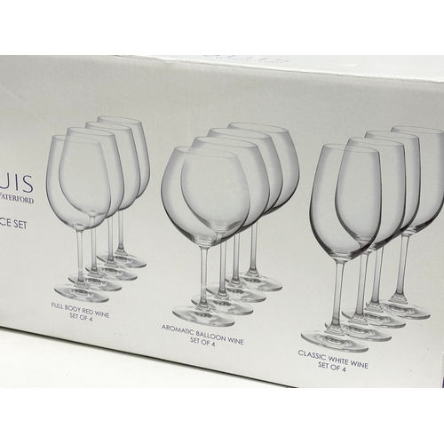 264 - A 12 piece set of Waterford Marquis wine glasses with box. 4 fully body red wine glasses. 4 aromatic... 