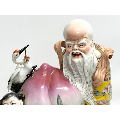 267 - A large good quality Chinese Early Republic Period porcelain Shou Lao statue. 40x45cm.