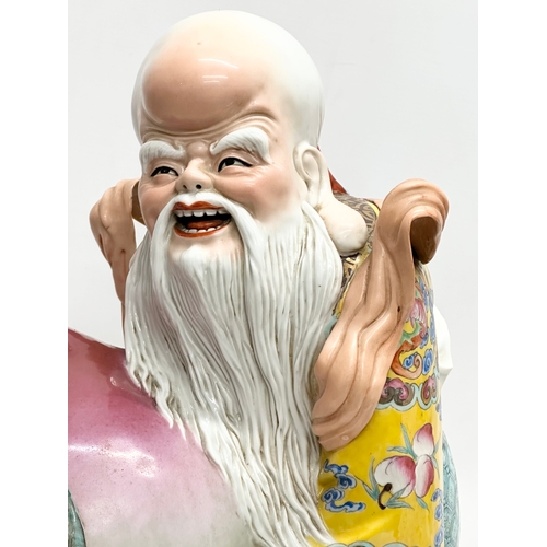 267 - A large good quality Chinese Early Republic Period porcelain Shou Lao statue. 40x45cm.