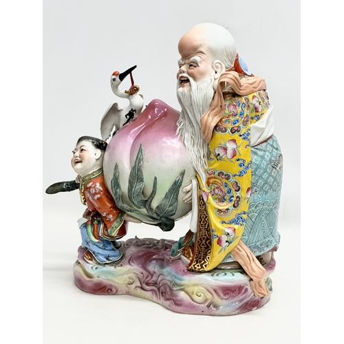 267 - A large good quality Chinese Early Republic Period porcelain Shou Lao statue. 40x45cm.