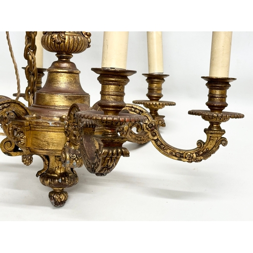 9 - An excellent quality gilt bronze Early 20th Century chandelier. 62x55cm. 102cm including chain.