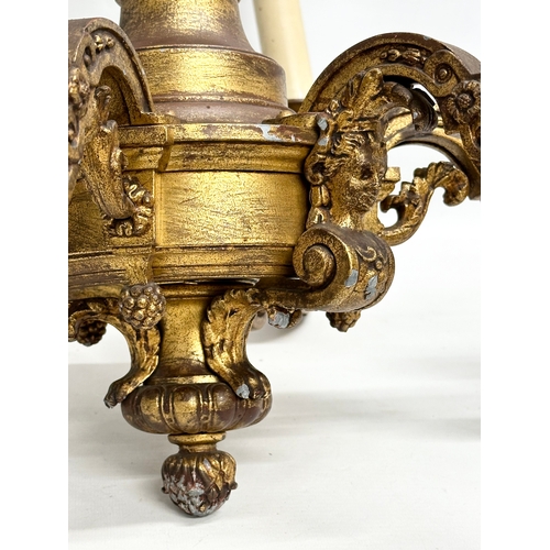 9 - An excellent quality gilt bronze Early 20th Century chandelier. 62x55cm. 102cm including chain.