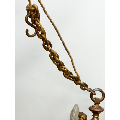 9 - An excellent quality gilt bronze Early 20th Century chandelier. 62x55cm. 102cm including chain.