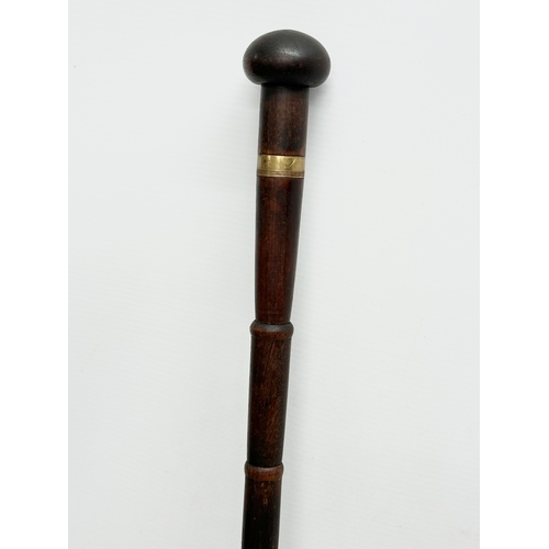 128 - A good quality 19th Century Victorian, brass mounted walking stick. 83.5cm.