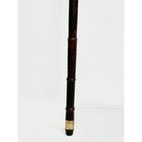 128 - A good quality 19th Century Victorian, brass mounted walking stick. 83.5cm.