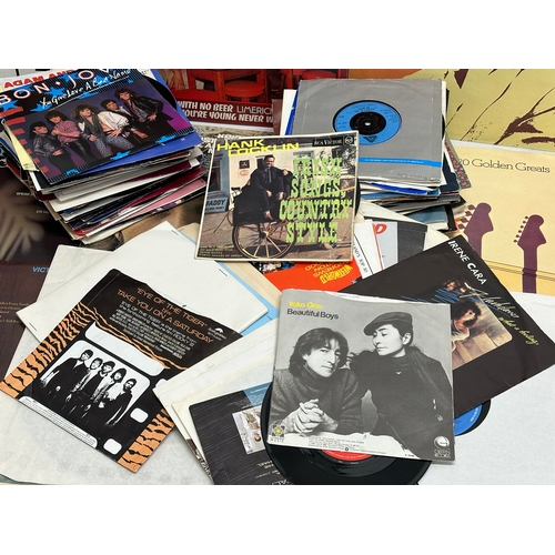 432 - A collection of LP, vinyl records, 45’s singles.